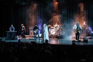 Simple black silhouette of a band