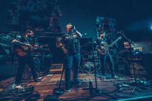 Simple black silhouette of a band